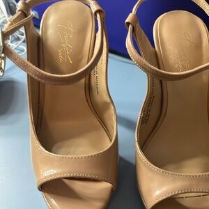 Good condition, worn few times. Will need minor surgery on ankle straps.